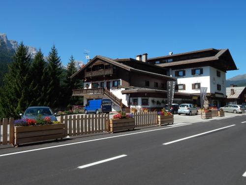 a house on the side of a road at Residence La Pineta in Padola