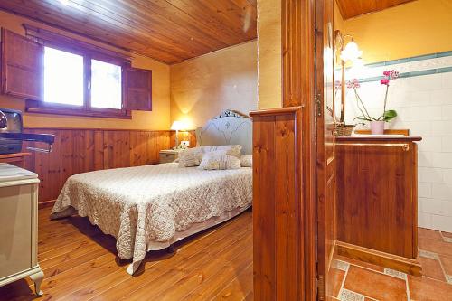 Katil atau katil-katil dalam bilik di Baqueira 1700 pie de pistas Tanau 4 hab