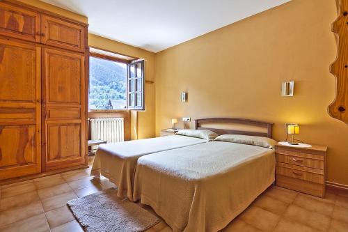 Postel nebo postele na pokoji v ubytování Apartamentos Salardu II