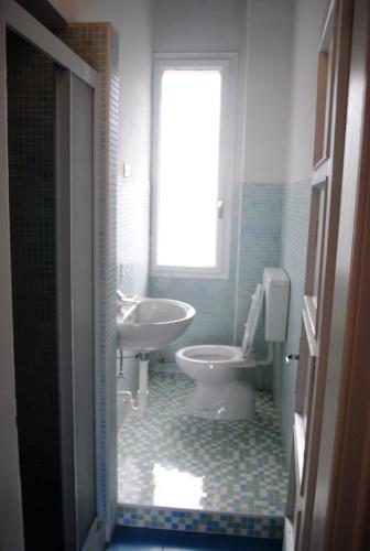 Ένα μπάνιο στο Dreaming Verona Rooms
