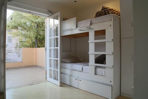 Poschodová posteľ alebo postele v izbe v ubytovaní Villa Hostel SP - Próximo ao Allianz Parque