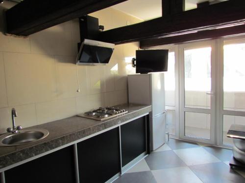 Kuchyň nebo kuchyňský kout v ubytování Guest house Khan