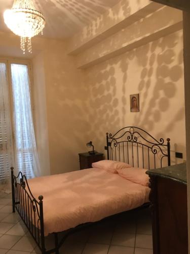 Posteľ alebo postele v izbe v ubytovaní WHOLE HOLIDAY HOME APARTMENT SPLENDID CIVITAVECCHIA da Pamino & Priscilla