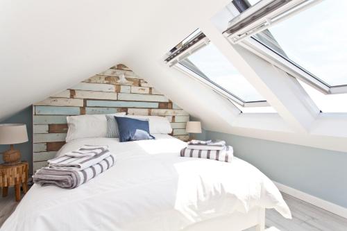 Ein Bett oder Betten in einem Zimmer der Unterkunft Seaside Cottage
