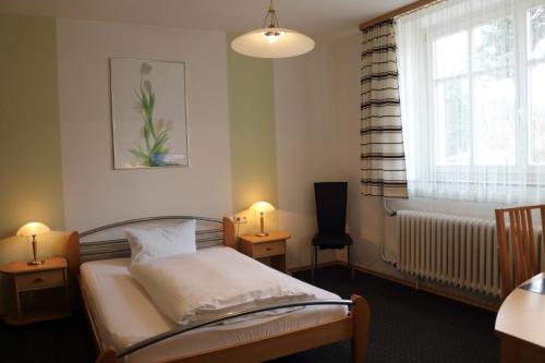 Postel nebo postele na pokoji v ubytování Hotel-Restaurant Johanneshof