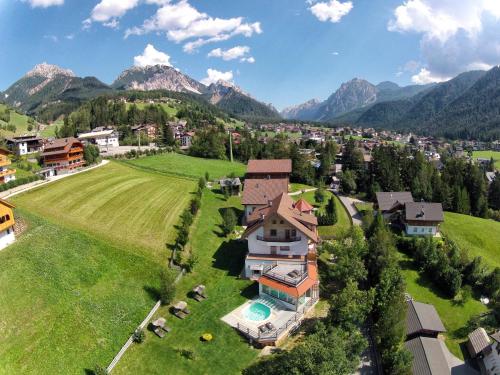 an aerial view of a house in the mountains at Villa Ortensia in San Vigilio Di Marebbe