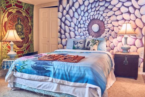 a bedroom with a bed with a rock wall at Harmony House Homestay in Sedona