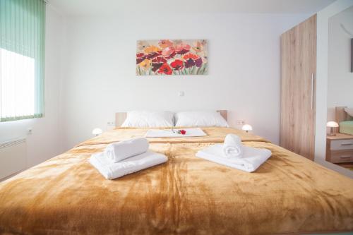 Кровать или кровати в номере Apartment Magic