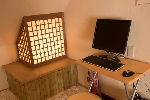 TV o dispositivi per l'intrattenimento presso J-Hoppers Kumano Yunomine Guesthouse