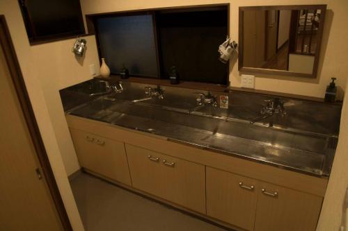 Foto dalla galleria di J-Hoppers Kumano Yunomine Guesthouse a Hongu