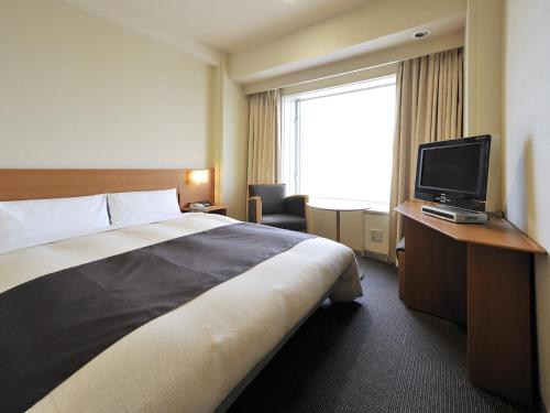 TV a/nebo společenská místnost v ubytování Hotel Crown Palais Kitakyushu