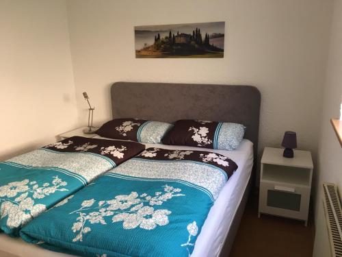 Кровать или кровати в номере Ferienwohnung Jucarm