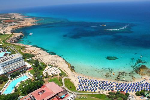 an aerial view of the beach and the ocean at Marina Hotel in Ayia Napa