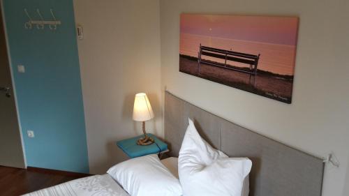 Postel nebo postele na pokoji v ubytování Hullám Villa B&B