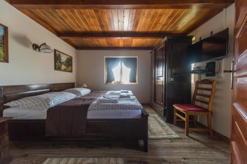 Posteľ alebo postele v izbe v ubytovaní Penzión Zlatá Putňa