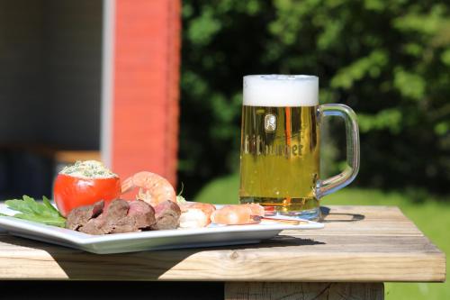 a plate of food and a glass of beer at CFK - Spiesen-Elversberg in Spiesen-Elversberg