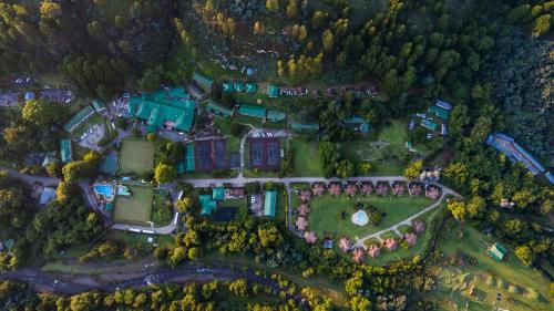 an aerial view of a large estate with homes at Gooderson Drakensberg Gardens Golf & Spa Resort in Drakensberg Garden
