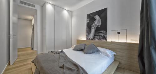 Krevet ili kreveti u jedinici u objektu Luxury Suites Collection - Lungomare Viale Milano 3