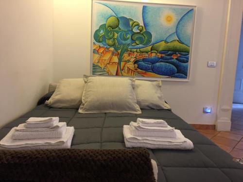 Säng eller sängar i ett rum på Gallery Bellini Apartment