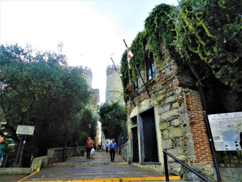 a brick building with a door on the side of it at Bigo Guest House in Genova