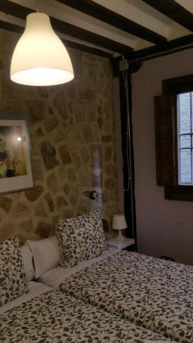 Ένα ή περισσότερα κρεβάτια σε δωμάτιο στο Toledo Flat, City Centre