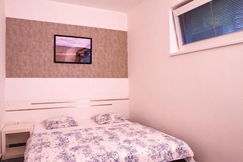 Posteľ alebo postele v izbe v ubytovaní Penzion Stará hora