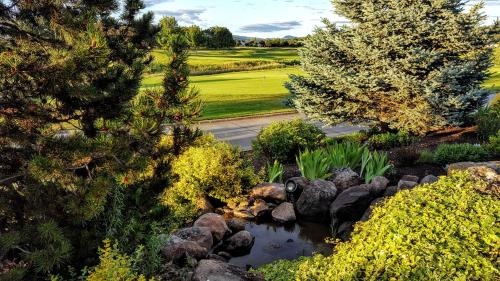 an aerial view of a garden with a pond at Resort at Eagle Point Golf Club Lodging in Medford