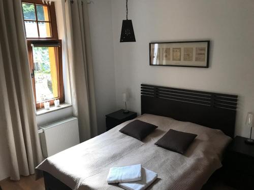 Posteľ alebo postele v izbe v ubytovaní Apartament Selaz