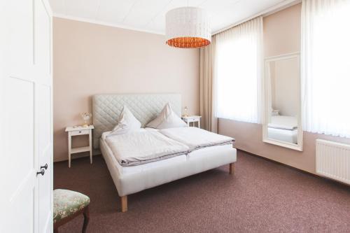 Posteľ alebo postele v izbe v ubytovaní Gasthaus zur Linde
