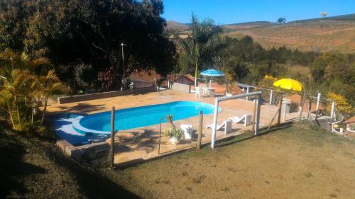 Vista de la piscina de Pousada Cachoeirinha o d'una piscina que hi ha a prop