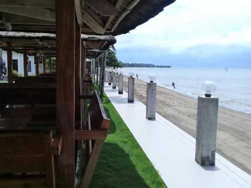 a building with a view of the beach at Sergi's Resort and Hotel in Palompon