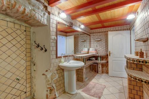 Ένα μπάνιο στο Apartments Popi