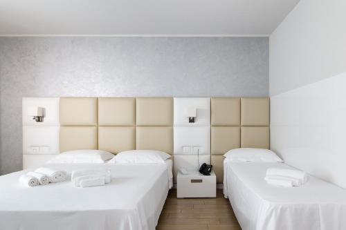 Katil atau katil-katil dalam bilik di Hotel Al Veliero