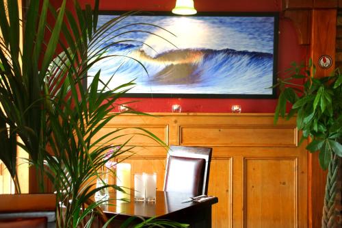 TV a/nebo společenská místnost v ubytování Maddens Bridge Bar & Guesthouse