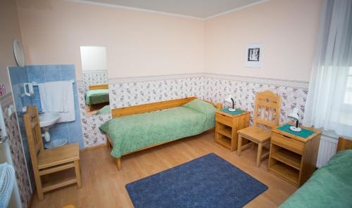 Una cama o camas en una habitación de Katariina Guesthouse