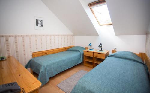 Una cama o camas en una habitación de Katariina Guesthouse