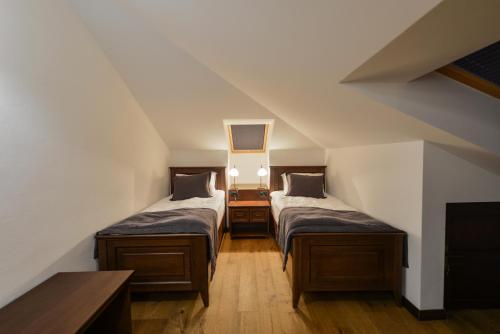 Una cama o camas en una habitación de Hotel Barleti