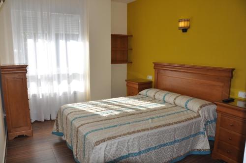Postel nebo postele na pokoji v ubytování Hotel de Alba
