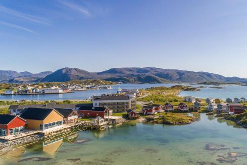an aerial view of a small town on the water at Sommarøy Arctic Hotel Tromsø in Sommarøy