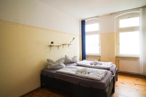 Postel nebo postele na pokoji v ubytování Apartments Kolo 77