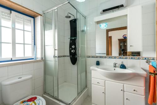 Ванна кімната в Casa das Conchas