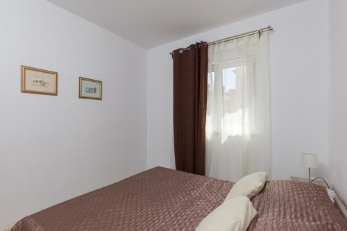 Katil atau katil-katil dalam bilik di Apartman Rokolj