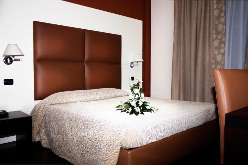 Ένα ή περισσότερα κρεβάτια σε δωμάτιο στο Hotel Ristorante Giada