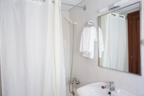 Ett badrum på Hotel Bruna