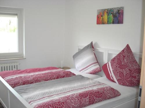Posteľ alebo postele v izbe v ubytovaní Ferienwohnung am Grasweg