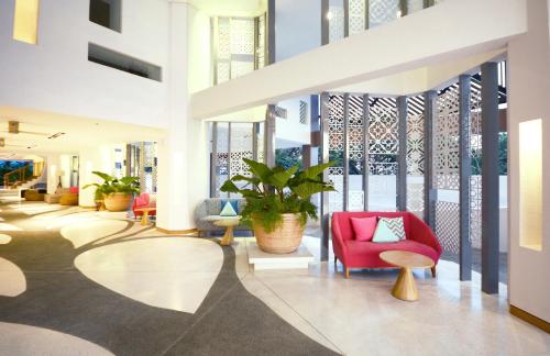 Ruang duduk di Hue Hotels and Resorts Puerto Princesa Managed by HII