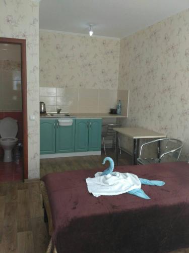 Ένα ή περισσότερα κρεβάτια σε δωμάτιο στο Guest House RELAX