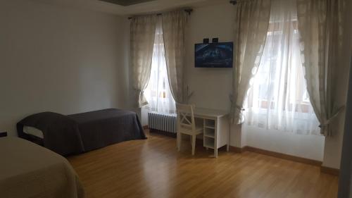A television and/or entertainment centre at Camere Santa Rita