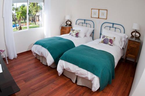 Postel nebo postele na pokoji v ubytování Hotel Papiros