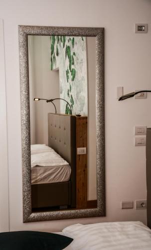 Una cama o camas en una habitación de Villa Torbole